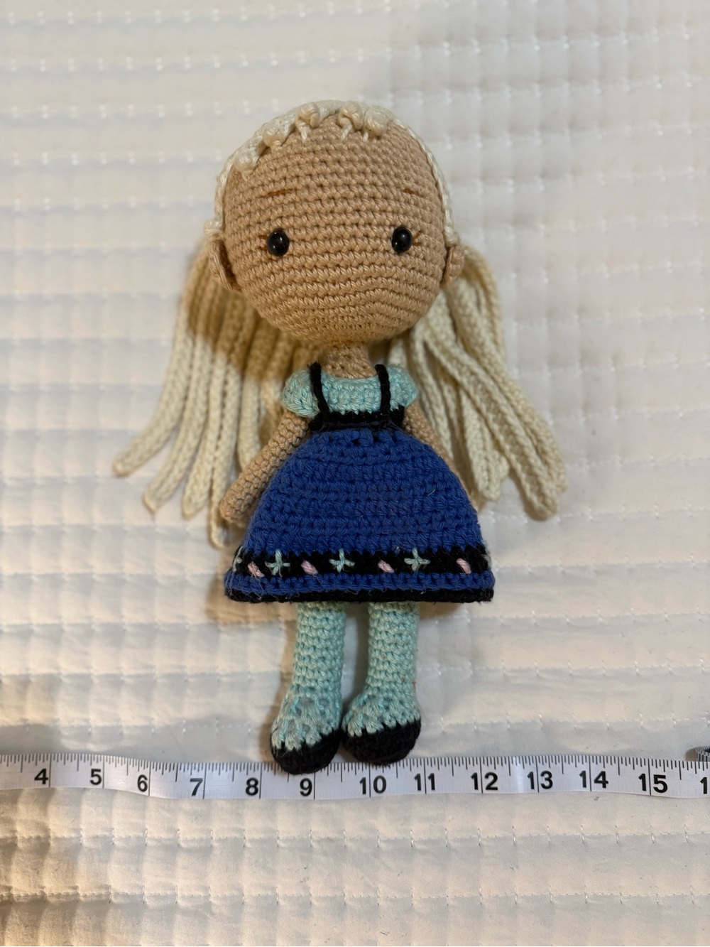 handmade amigurumi crochet doll inspired by Frozens Elsa